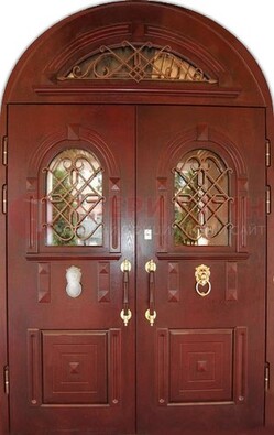 Стальная арочная дверь со стеклом и ковкой ДА-30 в дом из кирпича в Лобне