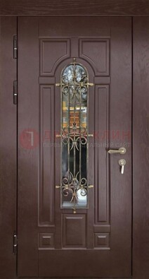 Темная железная дверь со стеклом и ковкой для частного дома ДСК-156 в Лобне