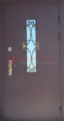 Металлическая дверь со стеклом и ковкой ДСК-77 в Лобне